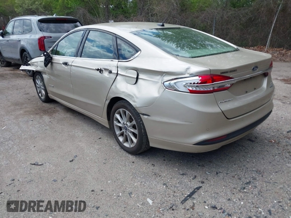 2017 Ford Fusion Hybrid SE с VIN 3FA6P0LU4HR301943, выставлен на аукционе IAAI как лот 42217709 с пробегом 102 791 миль миль и . История ставок и продаж доступна на DreamBid. Изображение 3.