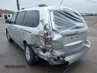 2012 Kia Sedona LX with VIN KNDMG4C72C6485952, listed as a IAAI auction lot 42029147 with 129,296 mi miles. Bid and sale history available at carsss.com. Image 3.