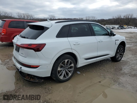 2021 Audi e-tron Premium Plus with VIN WA1LAAGE4MB003487, listed as a Copart auction lot 82790024 with 28,165 mi miles and Salvage title. Bid and sale history available at DreamBid. Image 3.