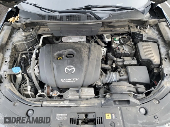 2018 Mazda CX-5 Touring z VIN JM3KFACM9J0300642, wystawiony jako Copart lot #80210854 z przebiegiem 118 309 mil mil oraz Szkoda całkowita • Salvage title. Historia ofert i sprzedaży dostępna na DreamBid. Obrazek 12.