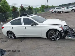 2016 Infiniti Q50 Red Sport 400 с VIN JN1FV7AR1GM450151, выставлен на аукционе IAAI как лот 42285181 с пробегом 169 914 миль миль и . История ставок и продаж доступна на DreamBid. Изображение 14.
