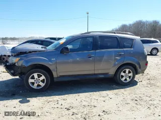 2009 Mitsubishi Outlander ES with VIN JA4LT21W59Z006995, listed as a IAAI auction lot 41639949 with 216,605 mi miles. Bid and sale history available at carsss.com. Image 14.