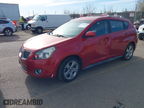 2009 Pontiac Vibe with VIN 5Y2SM67009Z401692, listed as a IAAI auction lot 41769199 with 143,904 mi miles. Bid and sale history available at carsss.com. Image 2.