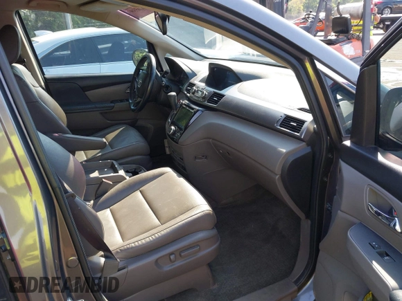 2015 Honda Odyssey EX-L z VIN 5FNRL5H61FB126947, wystawiony jako IAAI lot #42165599 z przebiegiem 213 058 mil mil oraz . Historia ofert i sprzedaży dostępna na DreamBid. Obrazek 5.