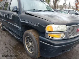 2003 GMC Yukon XL Denali with VIN 1GKFK66U43J243816, listed as a IAAI auction lot 41536356 with NaN miles. Bid and sale history available at carsss.com. Image 6.