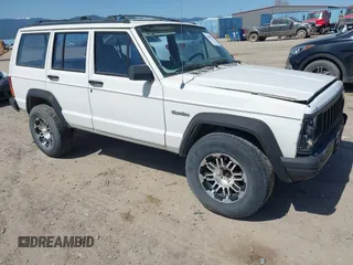 1996 Jeep Cherokee SE with VIN 1J4FT28S7TL307603, listed as a IAAI auction lot 42087278 with 141,994 mi miles. Bid and sale history available at carsss.com. Image 1.