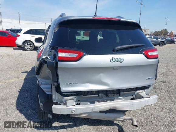 2016 Jeep Cherokee Latitude z VIN 1C4PJMCS5GW243746, wystawiony jako IAAI lot #41346904 z przebiegiem 98 616 mil mil oraz . Historia ofert i sprzedaży dostępna na DreamBid. Obrazek 6.