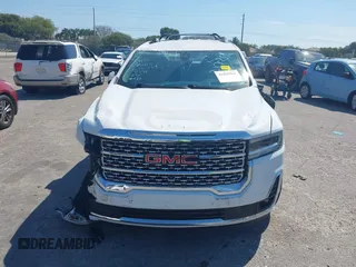 2021 GMC Acadia Denali with VIN 1GKKNPLS9MZ124774, listed as a IAAI auction lot 41859968 with 46,592 mi miles and . Bid and sale history available at carsss.com. Image 13.