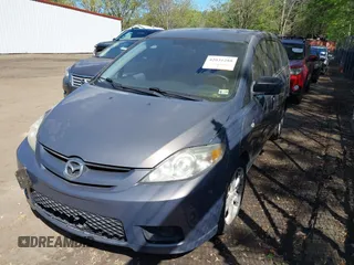 2007 Mazda 5 Touring with VIN JM1CR293870159225, listed as a IAAI auction lot 42031288 with 133,416 mi miles and . Bid and sale history available at carsss.com. Image 2.
