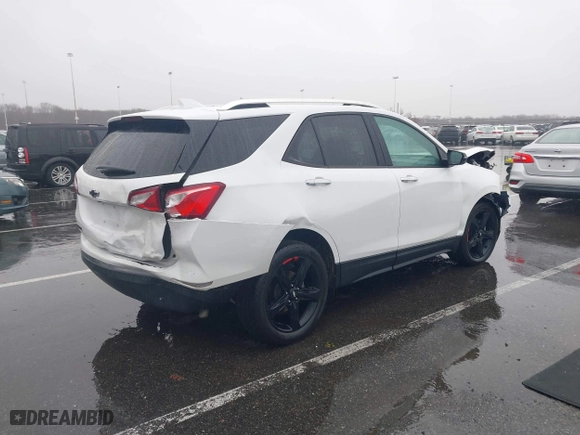 2021 Chevrolet Equinox Premier with VIN 2GNAXNEV7M6112087, listed as a IAAI auction lot 41102702 with 32,995 mi miles. Bid and sale history available at carsss.com. Image 4.