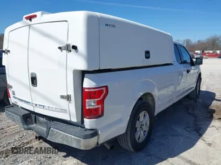 2018 Ford F-150 XL z VIN 1FTFX1C57JKF08037, wystawiony jako IAAI lot #41683537 z przebiegiem 195 633 mil mil oraz . Historia ofert i sprzedaży dostępna na DreamBid. Obrazek 4.