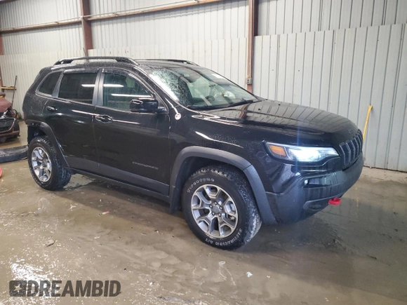 2022 Jeep Cherokee Trailhawk with VIN 1C4PJMBX3ND542576, listed as a Copart auction lot 85100224 with 18,911 mi miles and Salvage Title. Bid and sale history available at carsss.com. Image 4.