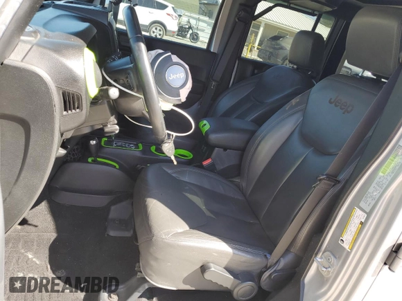 2016 Jeep Wrangler Unlimited 75th Anniversary with VIN 1C4BJWEG3GL265518, listed as a Copart auction lot 48952605 with 77,783 mi miles and Salvage title. Bid and sale history available at DreamBid. Image 7.