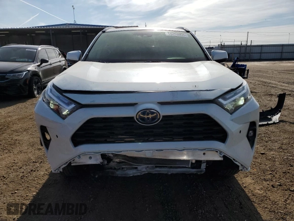 2022 Toyota RAV4 Hybrid XLE Premium with VIN JTMB6RFV1ND521761, listed as a Copart auction lot 54263055 with 46,391 mi miles and Salvage title. Bid and sale history available at DreamBid. Image 5.