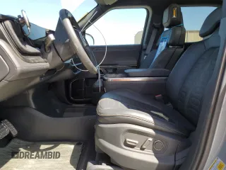 2022 Rivian R1T Adventure z VIN 7FCTGAAAXNN014983, wystawiony jako Copart lot #48987605 z przebiegiem Nie podano mil oraz Szkoda całkowita • Salvage title. Historia ofert i sprzedaży dostępna na DreamBid. Obrazek 7.