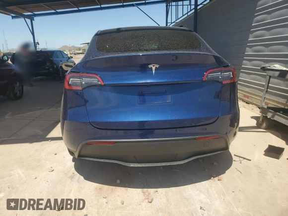 2023 Tesla Model Y Long Range with VIN 7SAYGDEE7PA112865, listed as a Copart auction lot 54626685 with 10,720 mi miles and Salvage Title. Bid and sale history available at DreamBid. Image 6.
