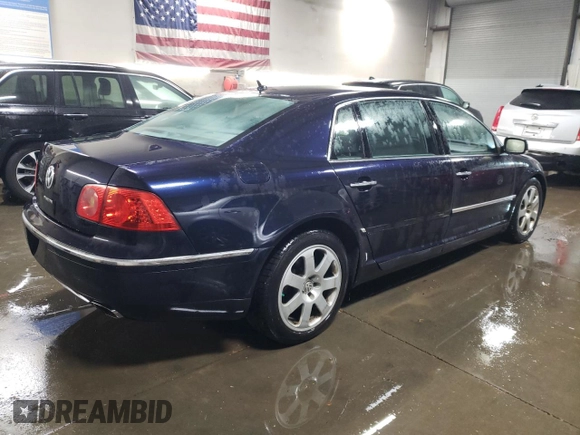 2004 Volkswagen Phaeton V8 z VIN WVWAF63D848008651, wystawiony jako Copart lot #78267004 z przebiegiem 146 193 mil mil oraz Szkody całkowita. Historia ofert i sprzedaży dostępna na DreamBid. Obrazek 3.
