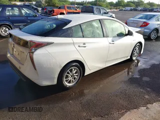 2017 Toyota Prius Two with VIN JTDKBRFUXH3549068, listed as a IAAI auction lot 41652285 with 112,044 mi miles. Bid and sale history available at carsss.com. Image 4.