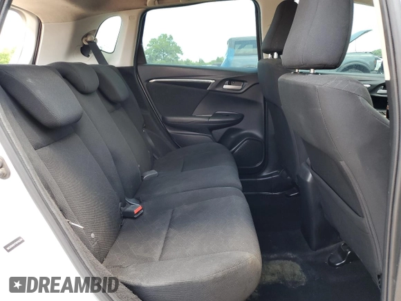 2015 Honda Fit EX-L z VIN 3HGGK5H81FM760204, wystawiony jako Copart lot #56827025 z przebiegiem 125 962 mil mil oraz Szkoda całkowita • Salvage title. Historia ofert i sprzedaży dostępna na DreamBid. Obrazek 10.