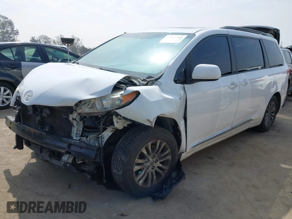 2014 Toyota Sienna XLE z VIN 5TDYK3DC7ES461445, wystawiony jako IAAI lot #42003360 z przebiegiem 153 404 mil mil oraz . Historia ofert i sprzedaży dostępna na DreamBid. Obrazek 2.