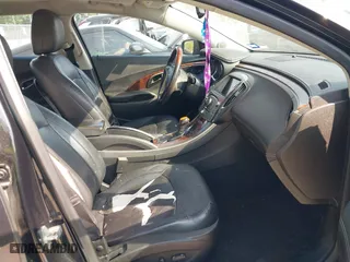 2013 Buick LaCrosse Premium 2 with VIN 1G4GH5E34DF150571, listed as a IAAI auction lot 41957477 with 1 mi miles. Bid and sale history available at carsss.com. Image 5.