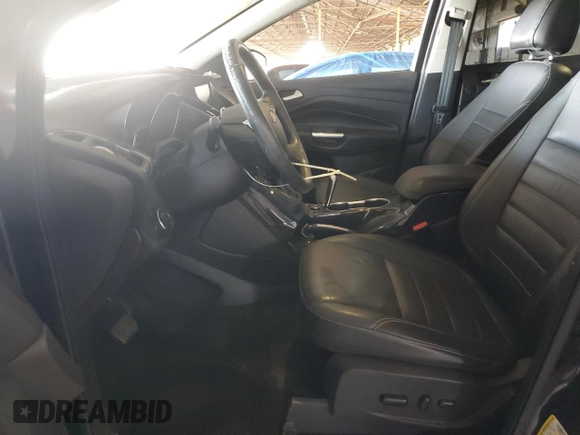 2015 Ford Escape Titanium with VIN 1FMCU0J91FUA17918, listed as a Copart auction lot 64525025 with 130,095 mi miles and Salvage title. Bid and sale history available at DreamBid. Image 7.