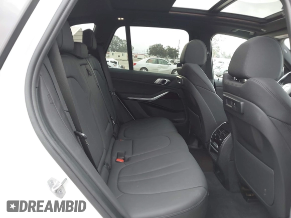 2021 BMW X5 xDrive40i with VIN 5UXCR6C03M9G36156, listed as a IAAI auction lot 42125009 with 30,877 mi miles. Bid and sale history available at carsss.com. Image 8.