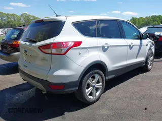 2015 Ford Escape SE with VIN 1FMCU0G97FUB08702, listed as a IAAI auction lot 42045471 with 190,782 mi miles and . Bid and sale history available at DreamBid. Image 4.