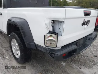 2023 Jeep Gladiator Sport S z VIN 1C6HJTAG5PL533877, wystawiony jako IAAI lot #41615284 z przebiegiem 41 191 mil mil oraz . Historia ofert i sprzedaży dostępna na DreamBid. Obrazek 6.