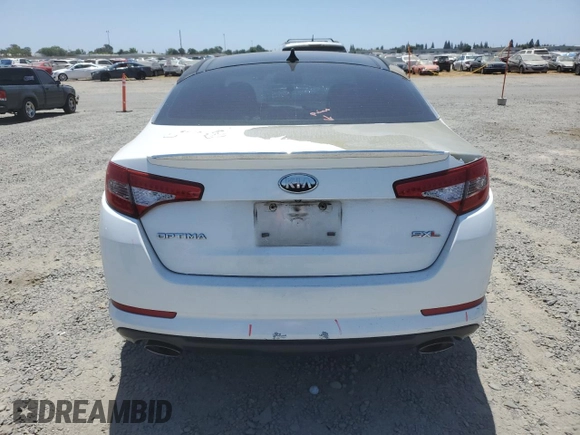 2013 Kia Optima SX с VIN 5XXGR4A69DG175625, выставлен на аукционе Copart как лот 60569165 с пробегом 125 827 миль миль и Списание • Salvage title. История ставок и продаж доступна на DreamBid. Изображение 6.
