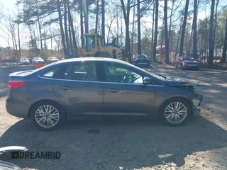 2015 Ford Focus Titanium with VIN 1FADP3J25FL333743, listed as a IAAI auction lot 41857057 with 120,917 mi miles and . Bid and sale history available at carsss.com. Image 14.