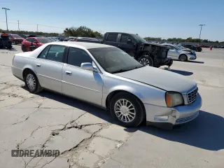 2003 Cadillac DeVille DHS z VIN 1G6KE54Y13U124690, wystawiony jako Copart lot #73757984 z przebiegiem 101 286 mil mil oraz Szkoda całkowita • Salvage title. Historia ofert i sprzedaży dostępna na DreamBid. Obrazek 4.