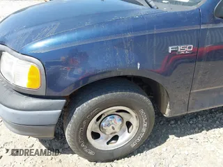 2003 Ford F-150 XL with VIN 1FTRF17283KA21397, listed as a IAAI auction lot 42069287 with 184,014 mi miles and . Bid and sale history available at DreamBid. Image 6.