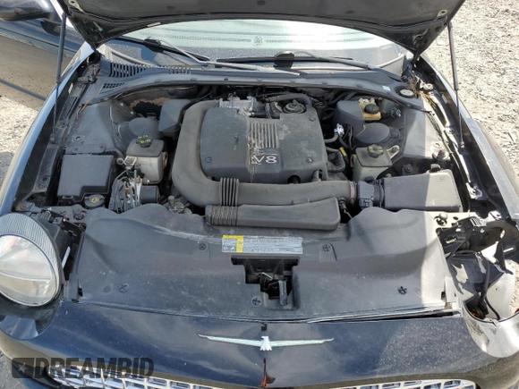 2002 Ford Thunderbird Hardtop Premium z VIN 1FAHP60A92Y117614, wystawiony jako Copart lot #59344735 z przebiegiem 83 723 mil mil oraz Szkoda całkowita • Salvage title. Historia ofert i sprzedaży dostępna na DreamBid. Obrazek 11.