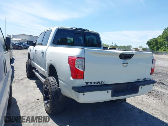 2017 Nissan Titan SL z VIN 1N6AA1E51HN503222, wystawiony jako IAAI lot #41908062 z przebiegiem 121 334 mil mil oraz . Historia ofert i sprzedaży dostępna na DreamBid. Obrazek 3.