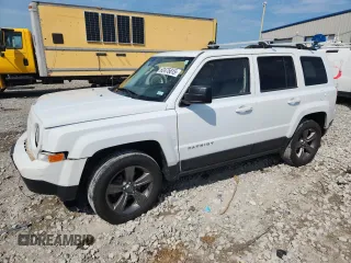 2015 Jeep Patriot High Altitude with VIN 1C4NJRFB5FD114125, listed as a Copart auction lot 62475615 with 104,438 mi miles and Salvage title. Bid and sale history available at DreamBid. Image 1.