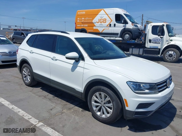 2019 Volkswagen Tiguan S with VIN 3VV1B7AX1KM101407, listed as a IAAI auction lot 42032761 with 51,868 mi miles. Bid and sale history available at carsss.com. Image 1.