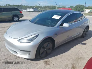2018 Tesla Model 3 Long Range Battery with VIN 5YJ3E1EB7JF104356, listed as a IAAI auction lot 41936961 with 90,932 mi miles and . Bid and sale history available at DreamBid. Image 18.