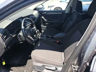 2024 Volkswagen Jetta S with VIN 3VW5M7BU4RM054556, listed as a IAAI auction lot 42852864 with 24,244 mi miles and . Bid and sale history available at DreamBid. Image 3.