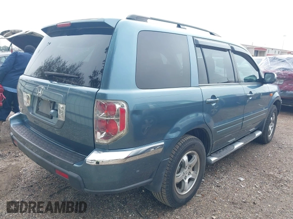 2007 Honda Pilot EX-L with VIN 5FNYF28717B034295, listed as a IAAI auction lot 41631628 with 195,572 mi miles. Bid and sale history available at carsss.com. Image 4.