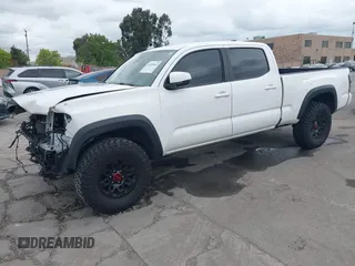 2021 Toyota Tacoma SR5 z VIN 3TMDZ5BN2MM100245, wystawiony jako IAAI lot #42078914 z przebiegiem 58 153 mil mil oraz . Historia ofert i sprzedaży dostępna na DreamBid. Obrazek 20.