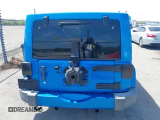 2016 Jeep Wrangler Unlimited Sahara with VIN 1C4HJWEG0GL154418, listed as a IAAI auction lot 41892333 with 102,410 mi miles and . Bid and sale history available at DreamBid. Image 16.