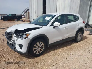 2016 Mazda CX-5 Sport with VIN JM3KE2BYXG0683318, listed as a IAAI auction lot 41777751 with 116,922 mi miles. Bid and sale history available at carsss.com. Image 21.