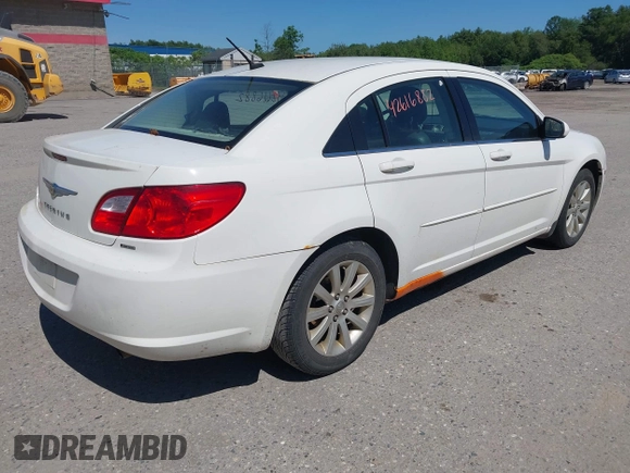 2010 Chrysler Sebring Limited with VIN 1C3CC5FD9AN199621, listed as a IAAI auction lot 42616882 with 110,512 mi miles and . Bid and sale history available at DreamBid. Image 4.