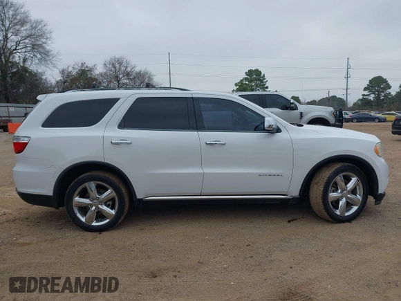 2013 Dodge Durango Citadel z VIN 1C4RDHEG6DC661116, wystawiony jako IAAI lot #41553298 z przebiegiem 208 767 mil mil oraz . Historia ofert i sprzedaży dostępna na DreamBid. Obrazek 13.