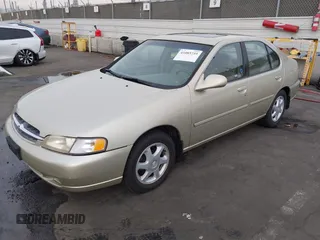 1998 Nissan Altima XE with VIN 1N4DL01D9WC110391, listed as a IAAI auction lot 41085735 with 100,322 mi miles. Bid and sale history available at carsss.com. Image 2.