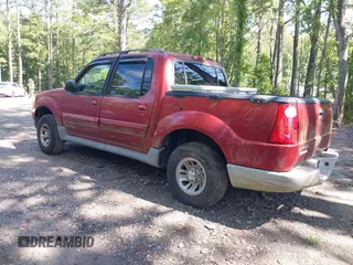 2001 Ford Explorer Sport Trac z VIN 1FMZU67EX1UA94698, wystawiony jako IAAI lot #42764474 z przebiegiem 299 653 mil mil oraz . Historia ofert i sprzedaży dostępna na DreamBid. Obrazek 3.