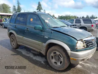 2002 Suzuki Grand Vitara JLX z VIN JS3TD62V824153848, wystawiony jako IAAI lot #42254276 z przebiegiem 181 007 mil mil oraz . Historia ofert i sprzedaży dostępna na DreamBid. Obrazek 1.