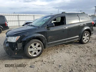 2011 Dodge Journey LUX with VIN 3D4PH9FG2BT535016, listed as a Copart auction lot 77885214 with 173,718 mi miles and Clean title. Bid and sale history available at DreamBid. Image 1.