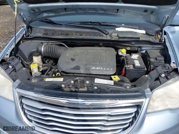 2013 Chrysler Town & Country Touring with VIN 2C4RC1BG7DR525986, listed as a IAAI auction lot 41920947 with 134,999 mi miles. Bid and sale history available at carsss.com. Image 10.